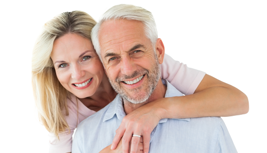 couple with dental implants smiling
